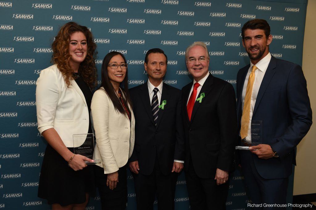 Michael Phelps and Allison Schmitt Hugging Allison Schmitt, Kana Enomoto, George Sigounas, Secretary Thomas Price, and Michael Phelps